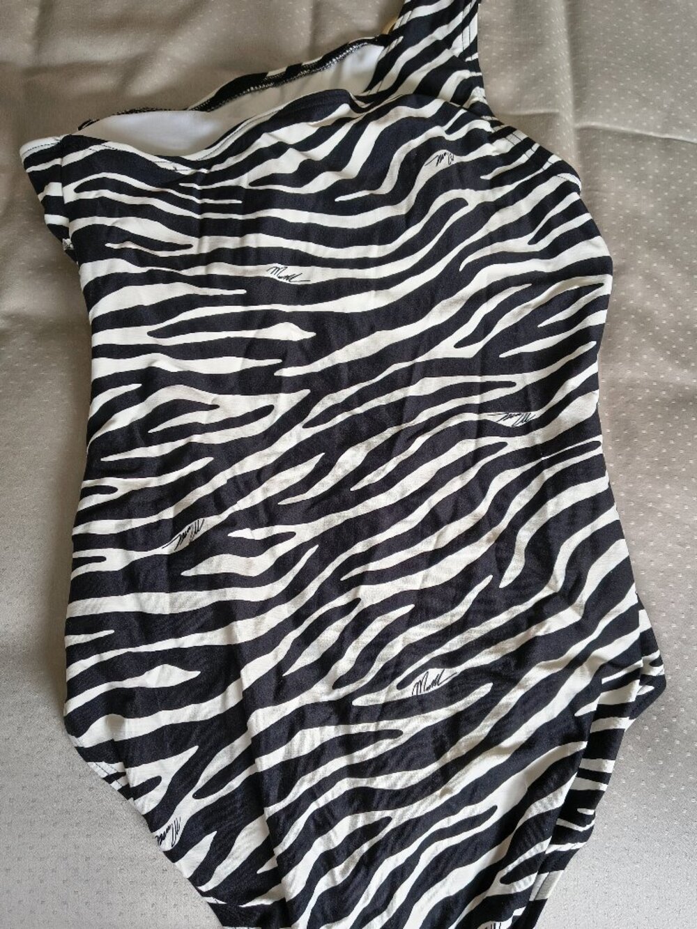 Black and white Michael Kors one shoulder bathing suit